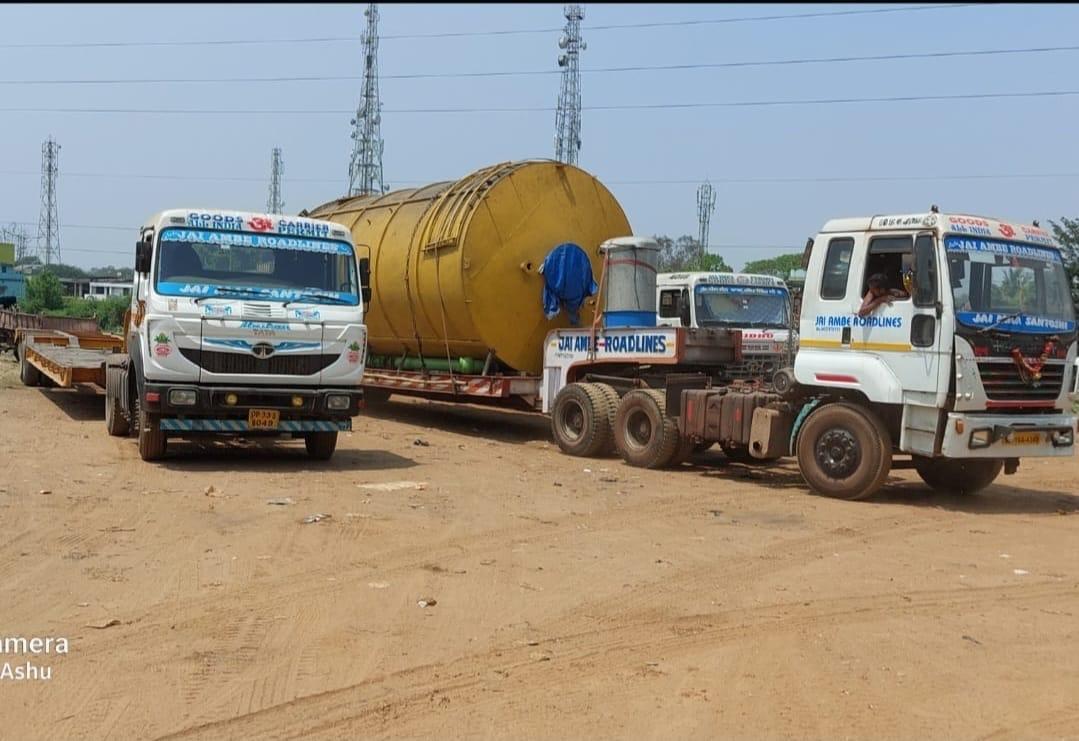 Two JARL trucks yellow tank